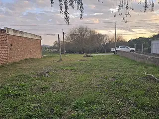 Terreno con mejoras