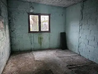Terreno con mejoras