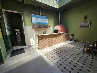 Centro, ex posada. Habitaciones con baño.